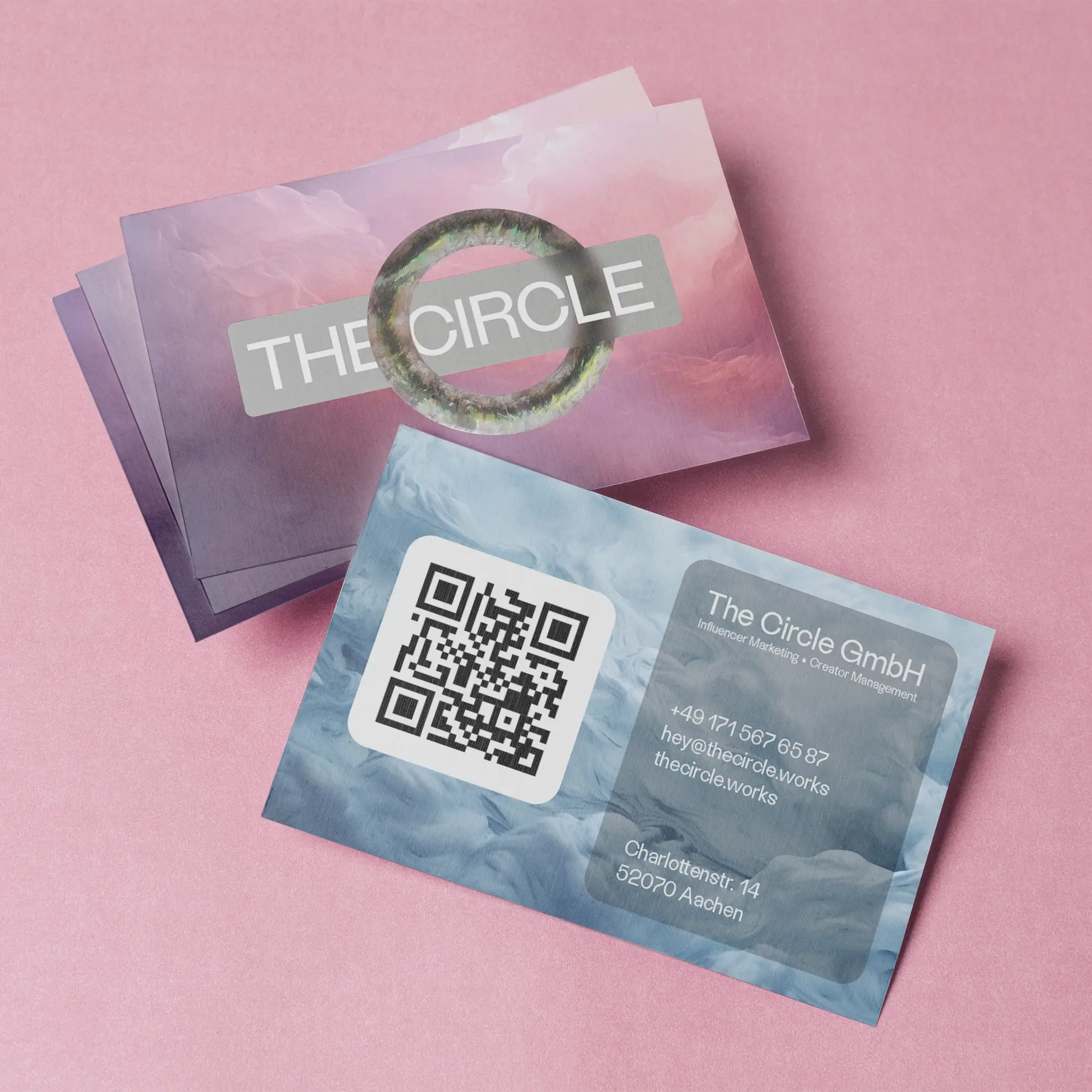 Some business cards showcasing the design for the talent management company The Circle GmbH.